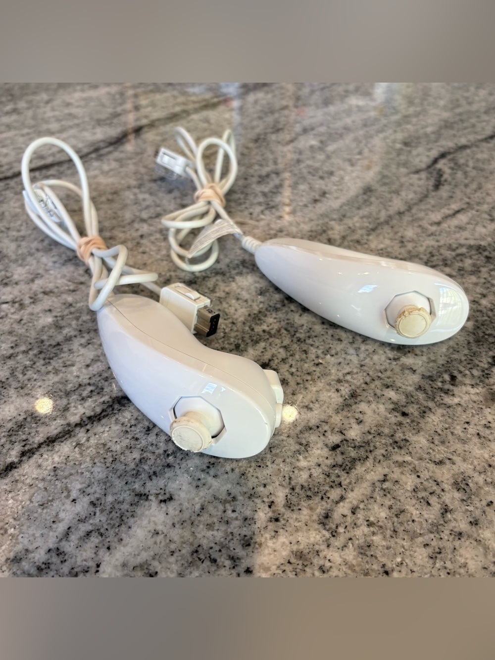 Lot Of 2 OEM Nintendo Wii White Nunchucks - Cosmetic Damage & Sticky Button